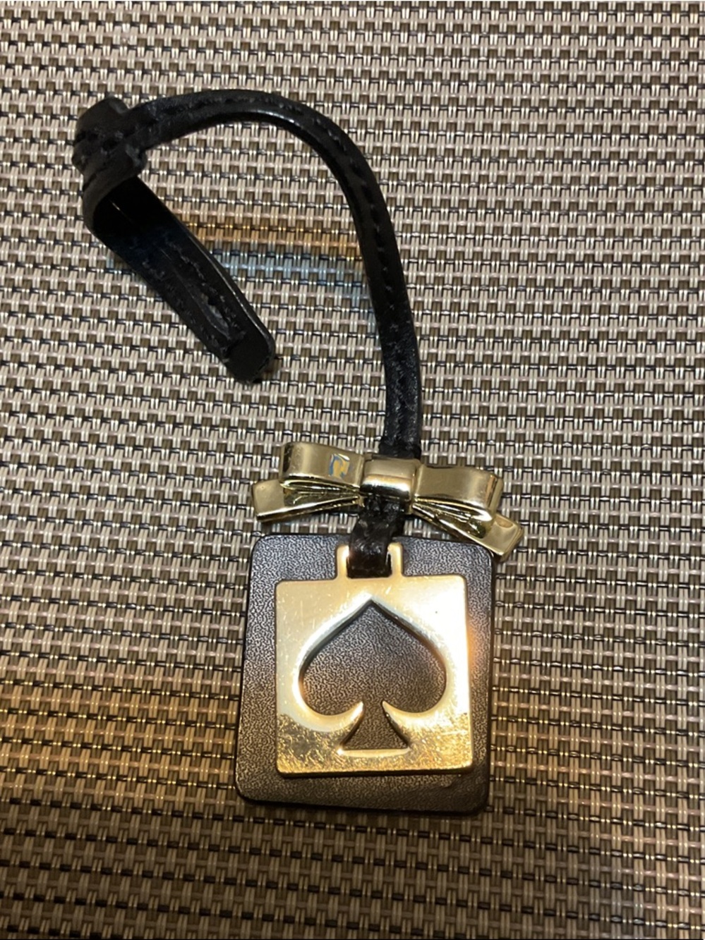 kate spade Black Leather Spade Tag with Gold Bow Accent